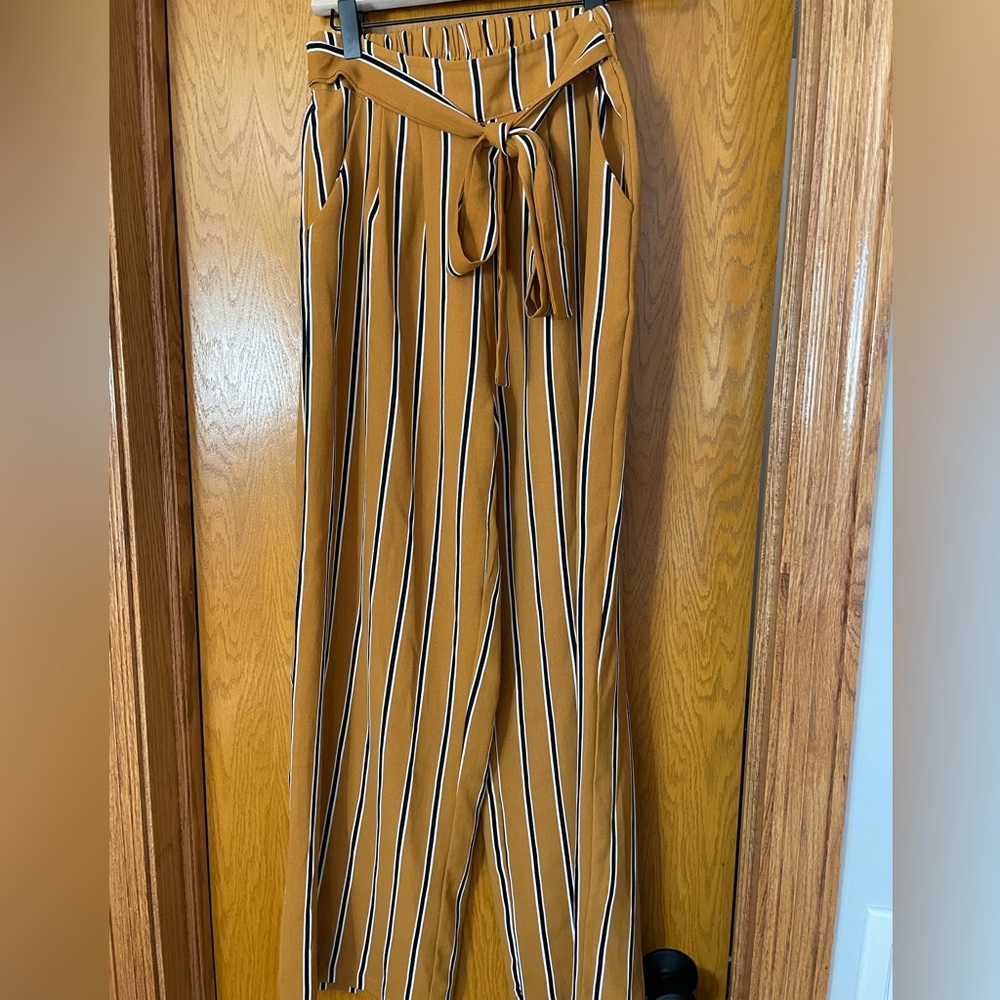 Oka Lisboa trousers, fits between a 4-6, burnt orange